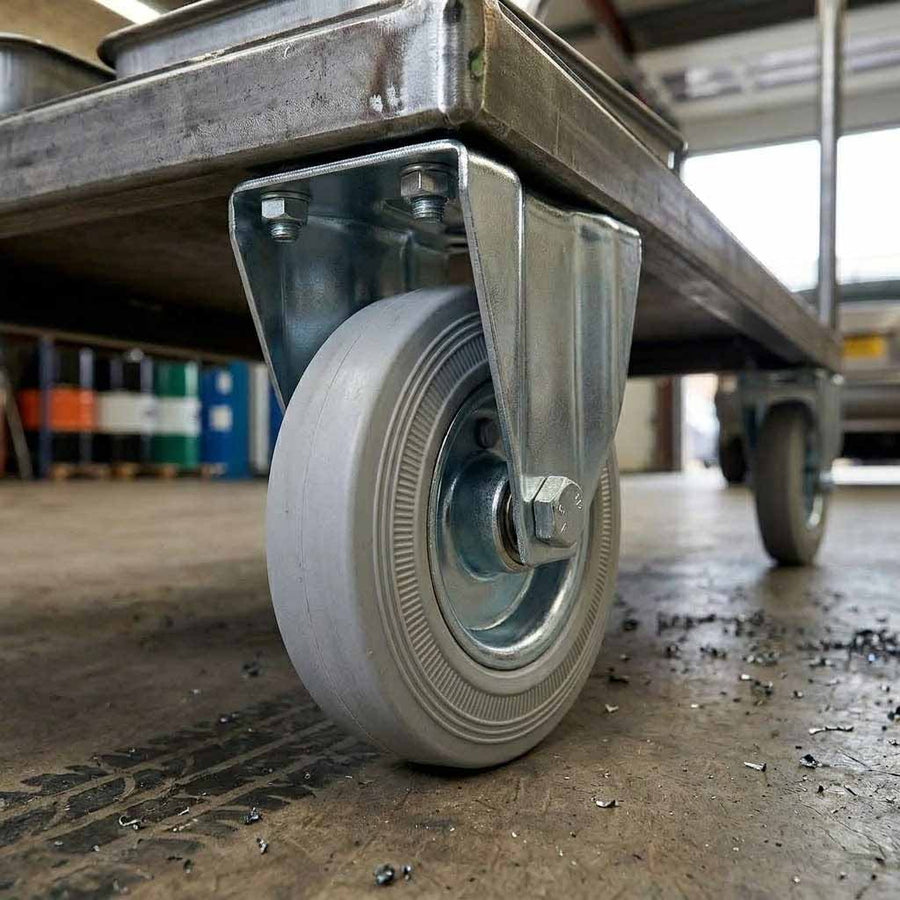 80mm Pressed Steel Fixed Castor Wheel - Grey Rubber on Pressed Steel - 60kg Load Capacity