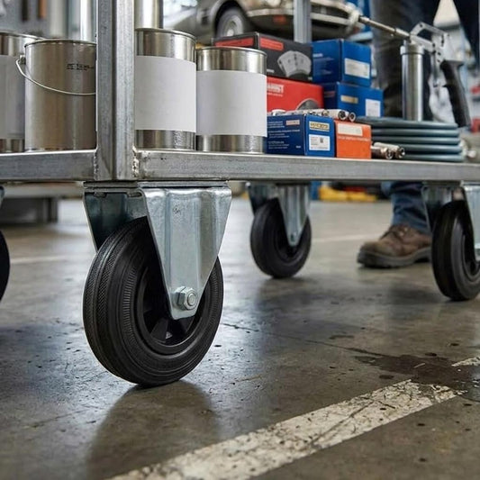 125mm Pressed Steel Fixed Castor with Black Rubber on Polypropylene Wheel - 110kg Load Capacity